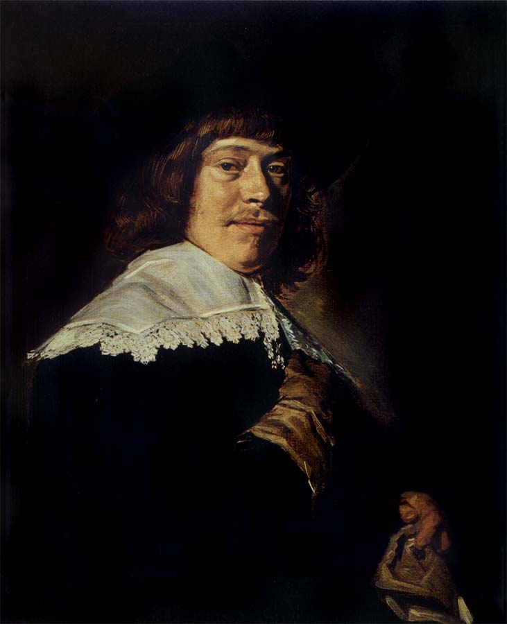 Portrait of a young man holding a glove